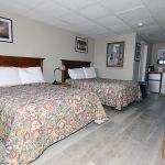 Guest Room With Kitchenette and Two Beds